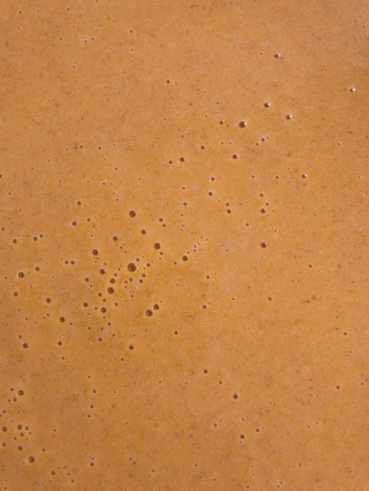 Liquid pumpkin dough for bakingの写真素材