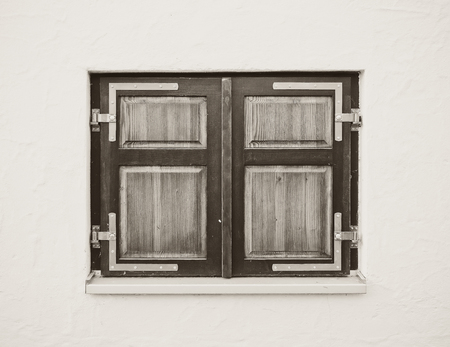 Wooden closed window in black and white