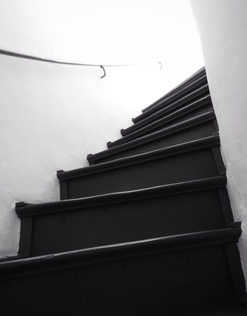 Dark and old staircase in black and whiteの写真素材