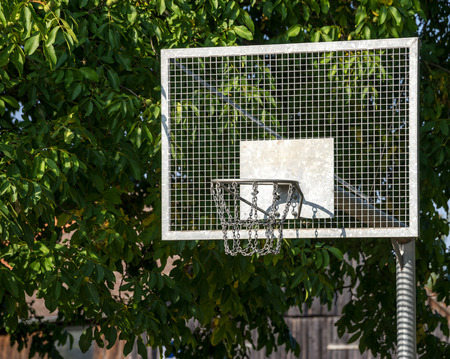 Metal and weathered basketball hoopの写真素材