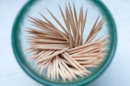 Several toothpicks in a glass closeupの写真素材