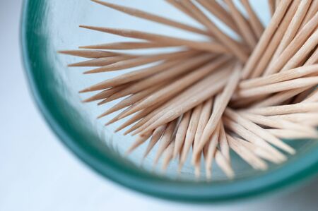Several toothpicks in a glass closeupの写真素材