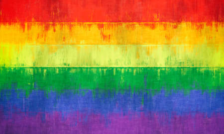 Pride LGBT rainbow color flag painted on a stone wall backgroundの写真素材