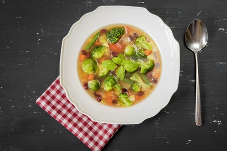 Italian vegetable soup on the tableの写真素材