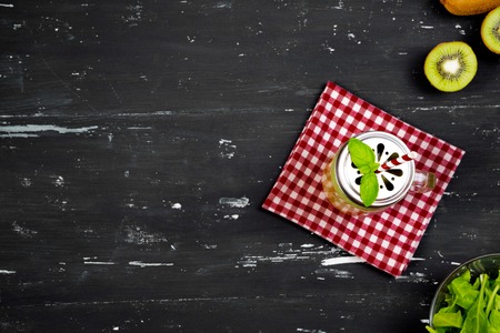 Smoothie with kiwi and spinach. Top view. Food backgroundの写真素材