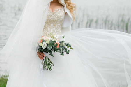 Beautiful bouquet of the bride. Summertime on the riverの写真素材