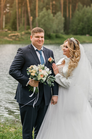 Wedding day. Newlyweds on the nature. Just marriedの写真素材