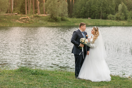 Wedding day. Newlyweds on the nature. Just marriedの写真素材
