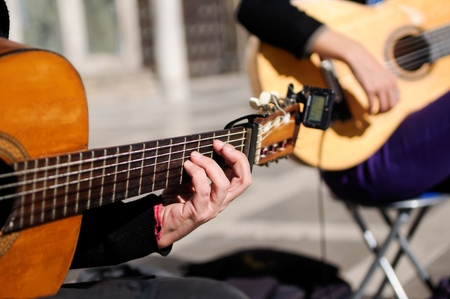 People playing guitar in streetの写真素材