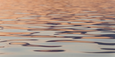 Rippled pattern on the water surface, Lake of the Woods, Ontario, Canadaの写真素材