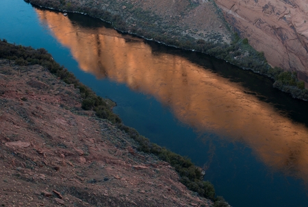 Reflection of rocks in water, Colorado River, Arizona-Utah, USAの写真素材