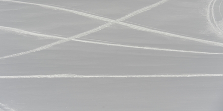 Tracks on snow covered slope, Sun Bowl, Whistler, British Columbia, Canadaの写真素材