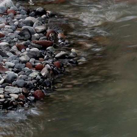 River flowing through rocks, Whistler, British Columbia, Canadaの写真素材