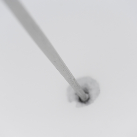 Close-up of a ski pole in snow, Symphony Amphitheatre, Whistler, British Columbia, Canadaの写真素材