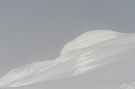 Low angle view of a snow covered mountain, Whistler, British Columbia, Canadaの写真素材