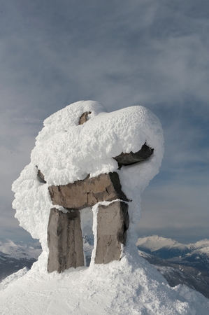 Snow covered Inuksuk, Whistler, British Columbia, Canadaの写真素材