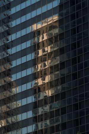 Low angle view of an office building, East Side, Chicago, Cook County, Illinois, USAの写真素材