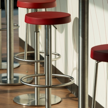 Bar stools at a bar counter, Chicago, Cook County, Illinois, USAの写真素材