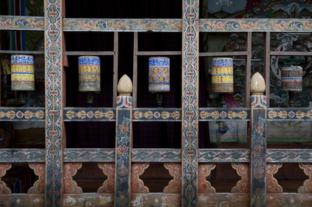 Prayer wheels at the temple in Trongsa Dzong, Trongsa, Bhutanのeditorial素材