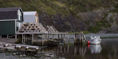 Lobster traps at dock, Southeast Brook Falls, Gros Morne National Park, Newfoundland and Labrador, Canadaのeditorial素材
