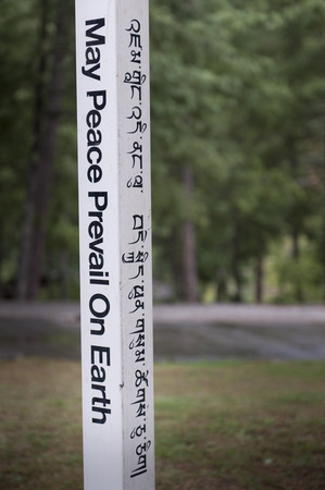 Close-up of text on a pole, Como Resort, Uma Paro, Paro District, Bhutanの写真素材