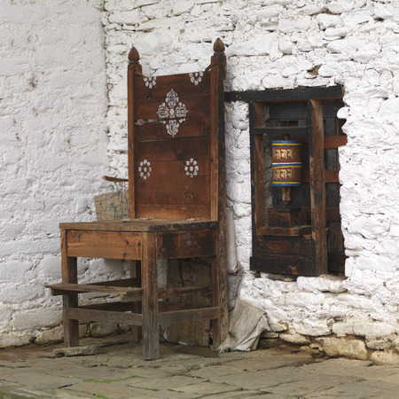 Chair at Jambay Lhakhang, Chokhor Valley, Bumthang District, Bhutanの写真素材