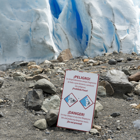 Danger signboard at Perito Moreno Glacier, Lake Argentinoの写真素材