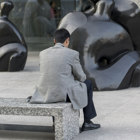 Man sitting on bench, Santiago, Santiago Metropolitan Region, Chileの写真素材