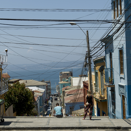 View of street with houses towards ocean, Valparaiso, Chileのeditorial素材