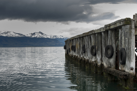 View of a jetty at lake, Golfo Almirante Montt, Puerto Natales, Patagonia, Chileの写真素材