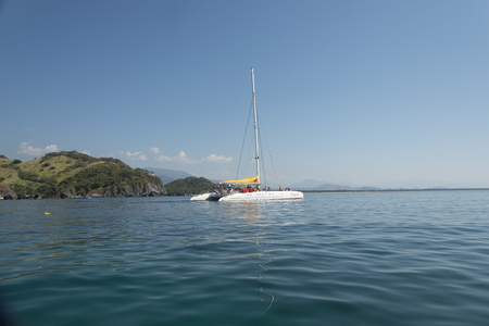 View of sailboat at sea, Ixtapa, Zihuatanejo, Guerrero, Mexicoのeditorial素材