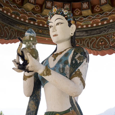 Close-up of a statue at Buddhist temple, Khamsum Yulley Namgyal Chorten, Punakha, Punakha District,...