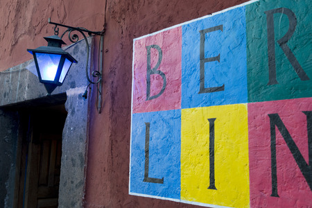 Signage painted on a wall, Zona Centro, San Miguel de Allende, Guanajuato, Mexicoの写真素材