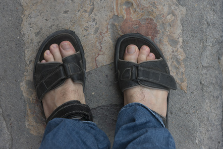Top view of sandals on a man's feet, San Miguel de Allende, Guanajuato, Mexicoの写真素材