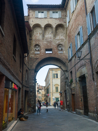 People on street amidst buildings, Siena, Tuscany, Italyのeditorial素材