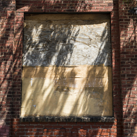 Boarded Up Window of a building, Minneapolis, Hennepin County, Minnesota, USAの写真素材