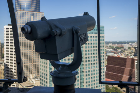 Coin-operated binoculars against Downtown Minneapolis, Hennepin County, Minnesota, USAの写真素材