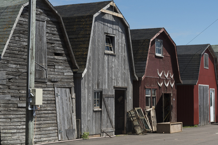 Fishing sheds at harbor, Lot 18, Prince County, Prince Edward Island, Canada.の写真素材