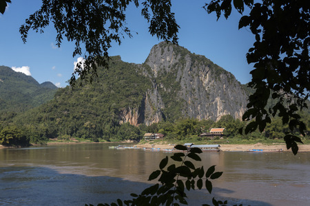 River with rocky mountains in background, River Mekong, Pak Ou District, Luang Prabang, Laosの写真素材