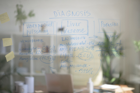 Medical office background. View of transparent, glass board with test resultsの写真素材