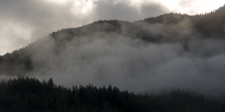 View of fog covered mountain, Furry Creek, British Columbia, Canada