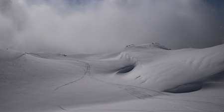 Ski tracks on snow covered mountain, Whistler, British Columbia, Canada