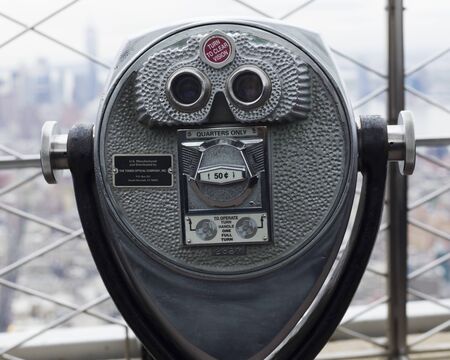 Close-up of coin operated binoculars, Empire State Building, Midtown Manhattan, New York City, New York State, USAの写真素材