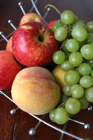 Apples, peaches and grapesの写真素材