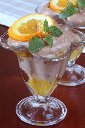 Chocolate mousse with orangesの写真素材