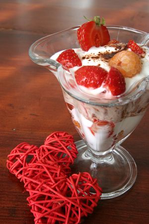 Yogurt dessert with fruits and heartsの写真素材