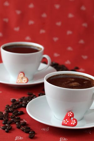 Coffee with hearts and coffee-beansの写真素材