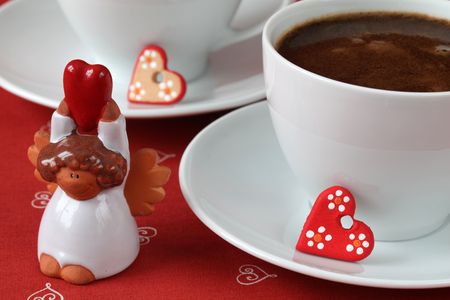 Coffee with hearts and angelの写真素材