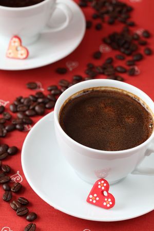 Coffee with hearts and coffee-beansの写真素材
