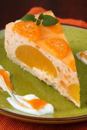 Peach mousse with tangerines and jellyの写真素材